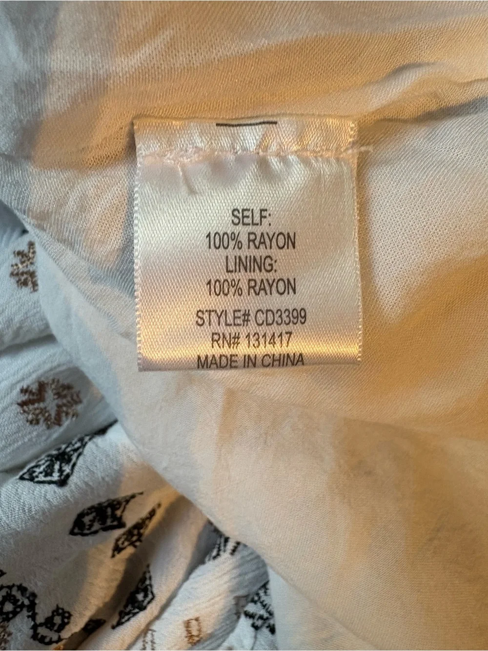 Blue Rain White Dress with Black and Tan Embroidered Print